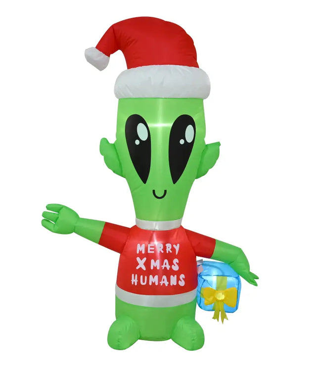 Inflatable green alien in a Santa hat and red shirt holding a blue gift for Christmas display