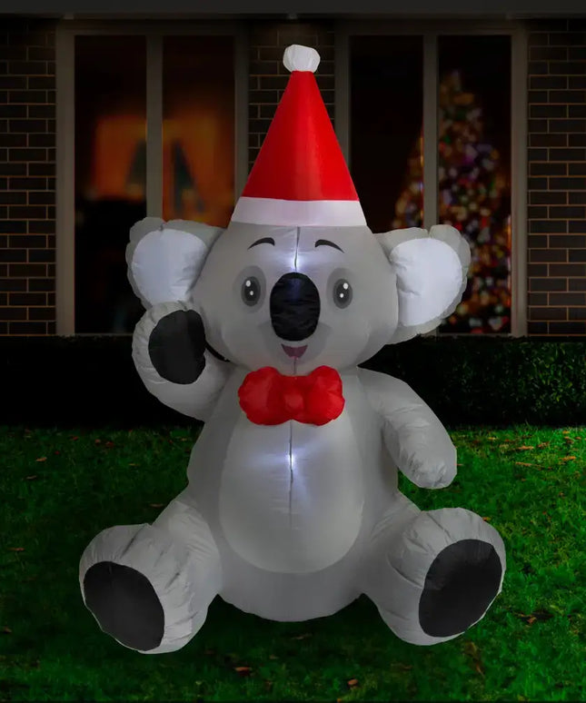 Inflatable Koala with Santa hat showcasing the 1.5M Sitting Koala Christmas Inflatable