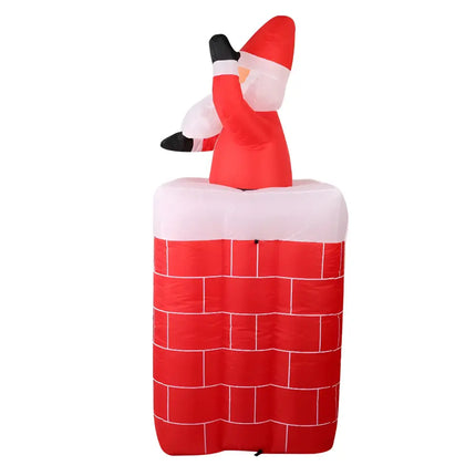 Inflatable Santa in chimney Christmas decoration illuminated for festive outdoor display