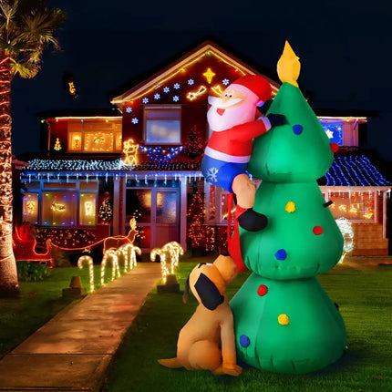 Inflatable Santa climbing a Christmas tree, part of the 1.8M Christmas Inflatable Santa Decorations