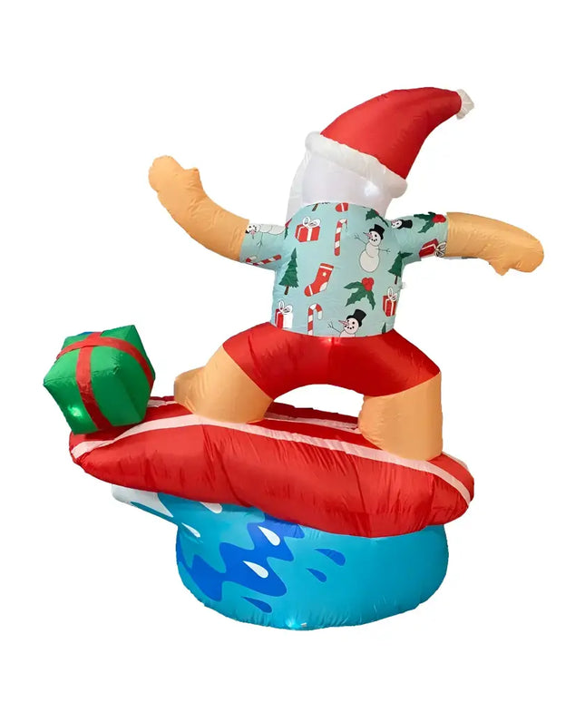 Inflatable Santa surfing with a gift, perfect for Christmas beach decor with LED lights