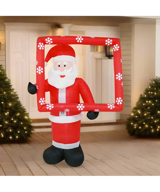Inflatable Santa holding a snowflake frame for festive seasonal decoration