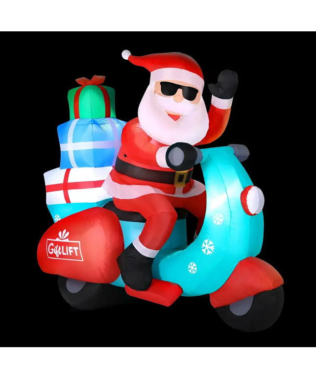 Inflatable Santa on a scooter carrying gifts for Christmas celebrations