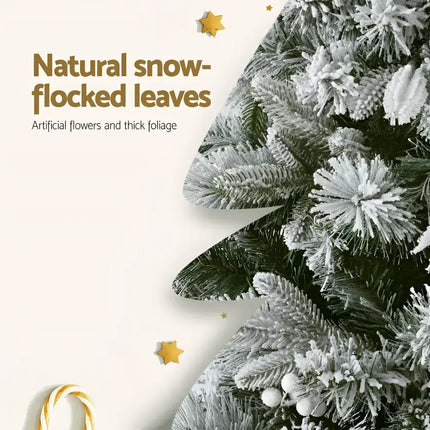 Artificial Christmas tree with snow flocked tips, measuring 1.8 meters for festive decor