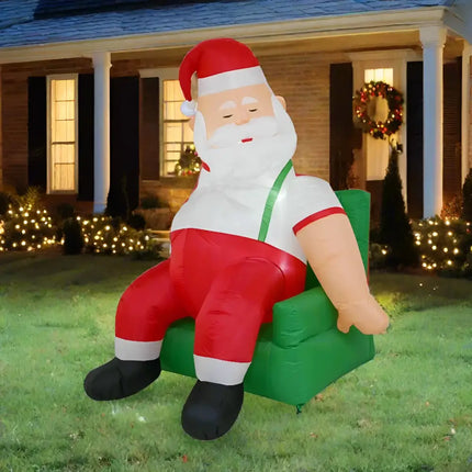 Inflatable Santa seated in a green armchair for the 1.9M Couch Potato Santa Christmas Inflatable