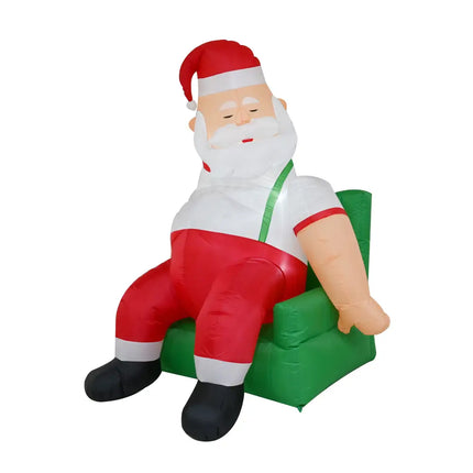 Inflatable Santa napping in a green chair, part of the 1.9M Couch Potato Santa Christmas Inflatable display