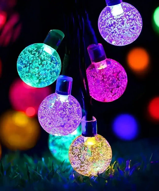Colorful bubble string lights featured in the 100 Low Voltage LED Bubble Ball String Lights Christmas decoration