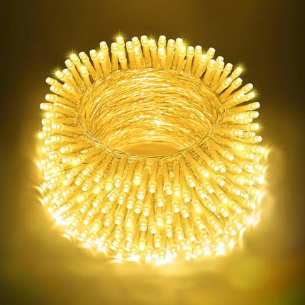 Coiled string of warm white LED lights from 1000 Solar LED Fairy Lights Christmas decoration