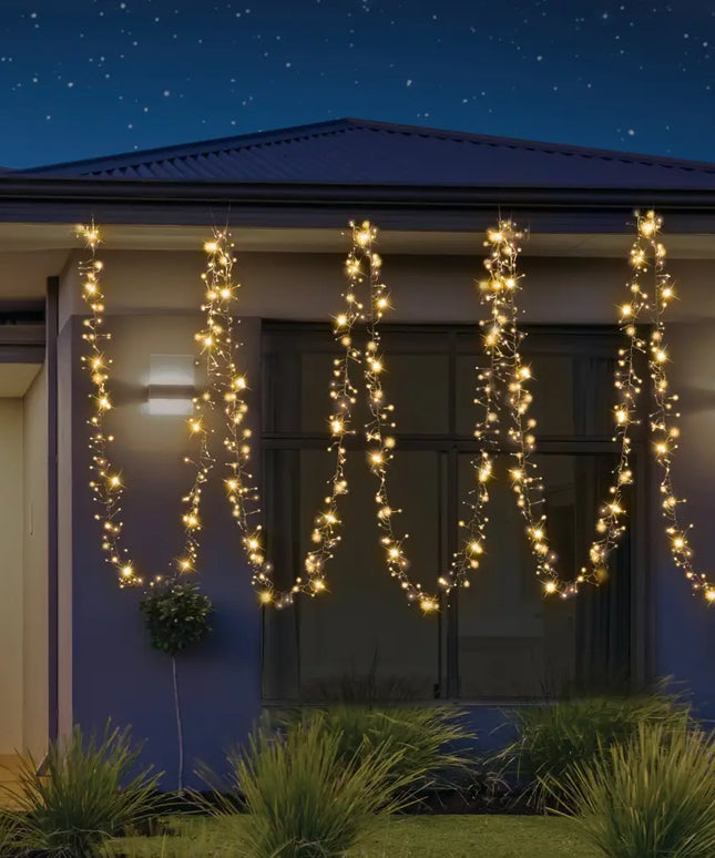 Festive outdoor string lights with 720 red and white LEDs on a 10-meter length