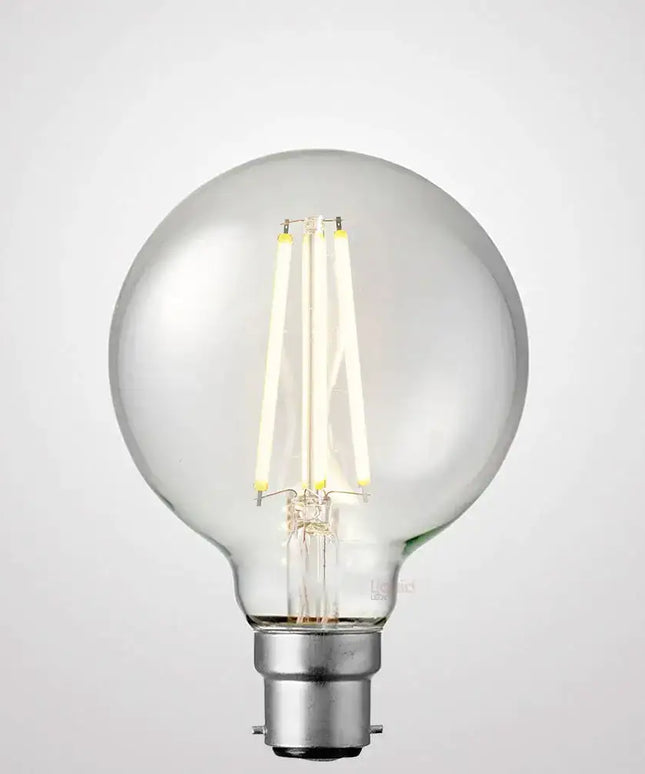 12W G95 LED Globe B22 Clear in Soft White