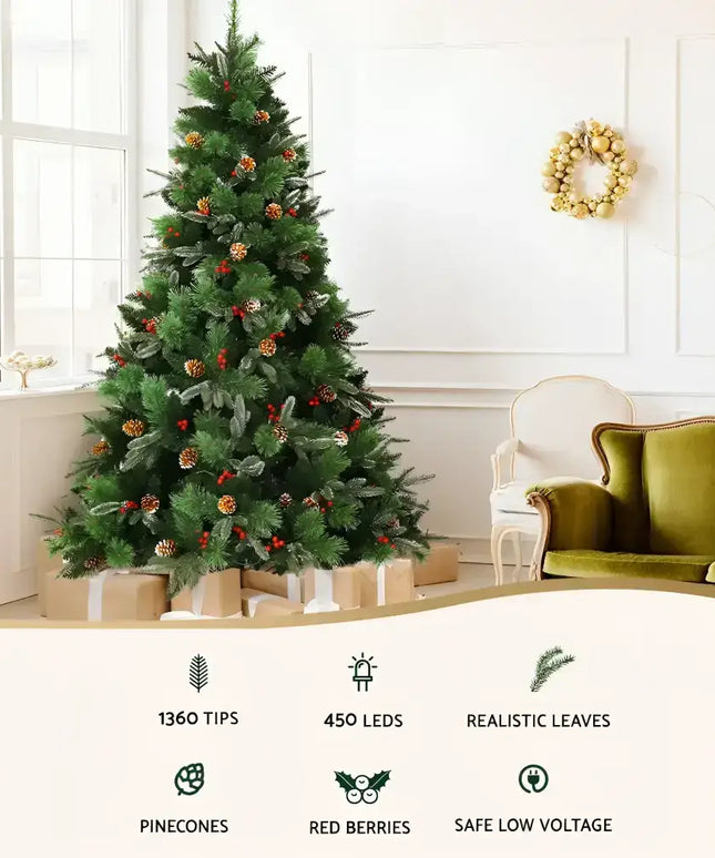 Decorated artificial Christmas tree with pine cones and red berries featuring prelit warm LED lights