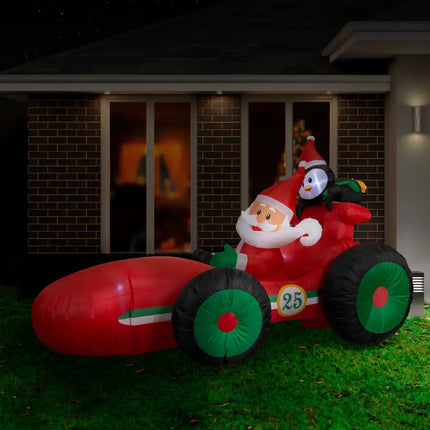 Inflatable Santa and Penguin Race Car decoration displayed in the 2.25M Santa Race Car product