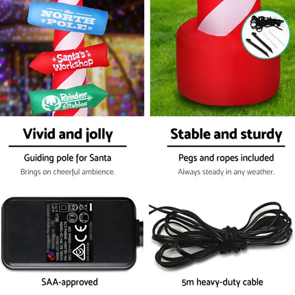 Brightly lit 2.4M Christmas Inflatable Candy Pole with festive decorative details