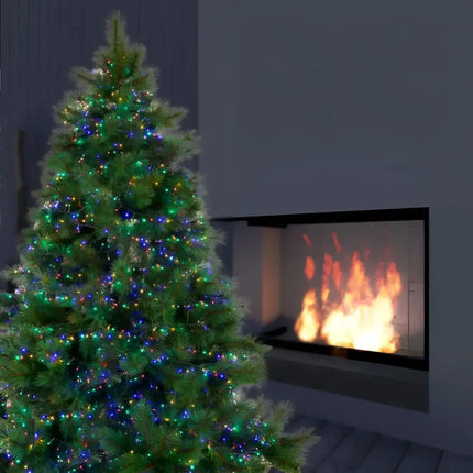 Illuminated Christmas tree with warm white LED sparkle lights on a 50-meter string