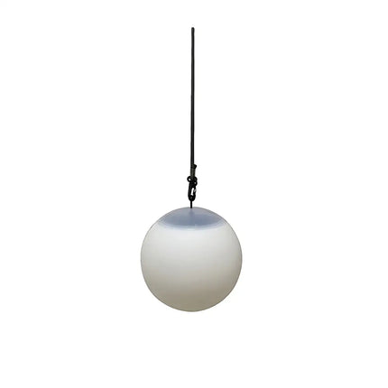 Eco-friendly solar ball lights illuminating a garden with soft, colorful glow at night.