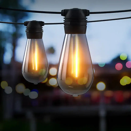 Hanging string lights in an outdoor setting for festive illumination with solar power
