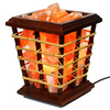 Close-up of hand-crafted Himalayan salt chunks in a bamboo basket lamp.