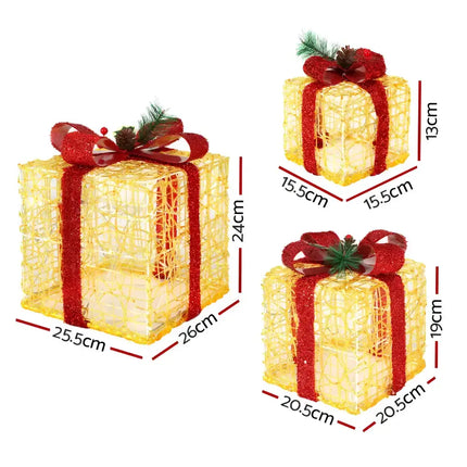 Illuminated Christmas gift boxes with red ribbon from the 3 PCS Christmas Lights Gift Box Set 48 LED Decorations