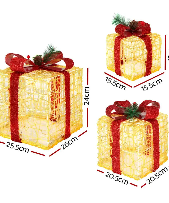 Illuminated Christmas gift boxes with red ribbon from the 3 PCS Christmas Lights Gift Box Set 48 LED Decorations