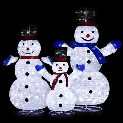 Illuminated snowman family decoration with LED fairy lights for festive holiday decor