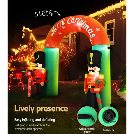 Inflatable Christmas archway with illuminated toy soldier figures for festive decoration