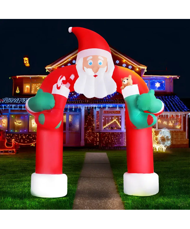 Outdoor Inflatable Santa Archway decorated with lights for Christmas celebrations
