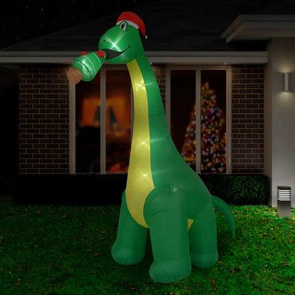 Inflatable green dinosaur with Santa hat and LED lights from 3M Giant Brontosaurus series