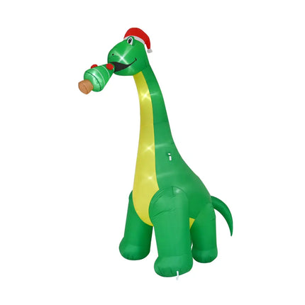 Inflatable green Tyrannosaurus Rex with Santa hat and bottle, featuring LED lights for festive decoration