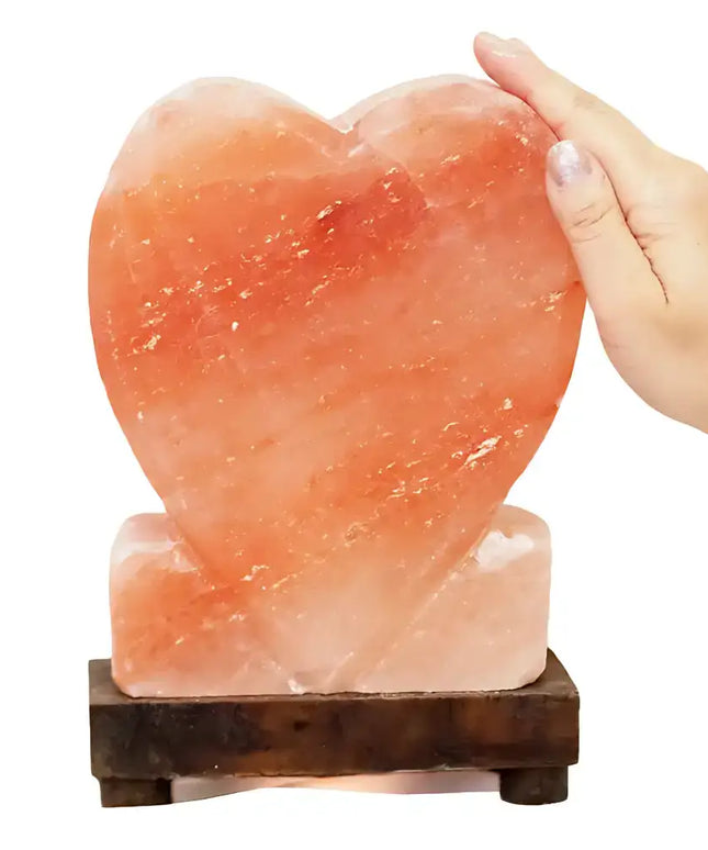 Romantic upright heart Himalayan salt lamp made from 100% natural salt with an included 12W bulb and cord.