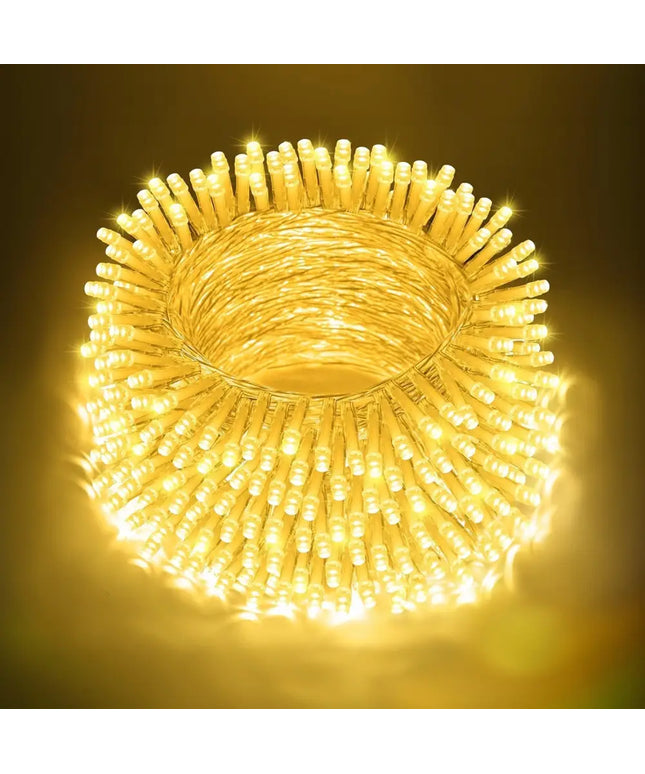 Coiled string of warm white LED fairy lights for Christmas decoration in the 500 Solar LED Fairy Lights 8 Function Memory Hold Multicolor product