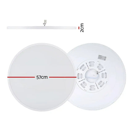 Round white ceiling light fixture from the 54W Tri Colour Ultra-THIN LED Oyster Lamp 60cm series
