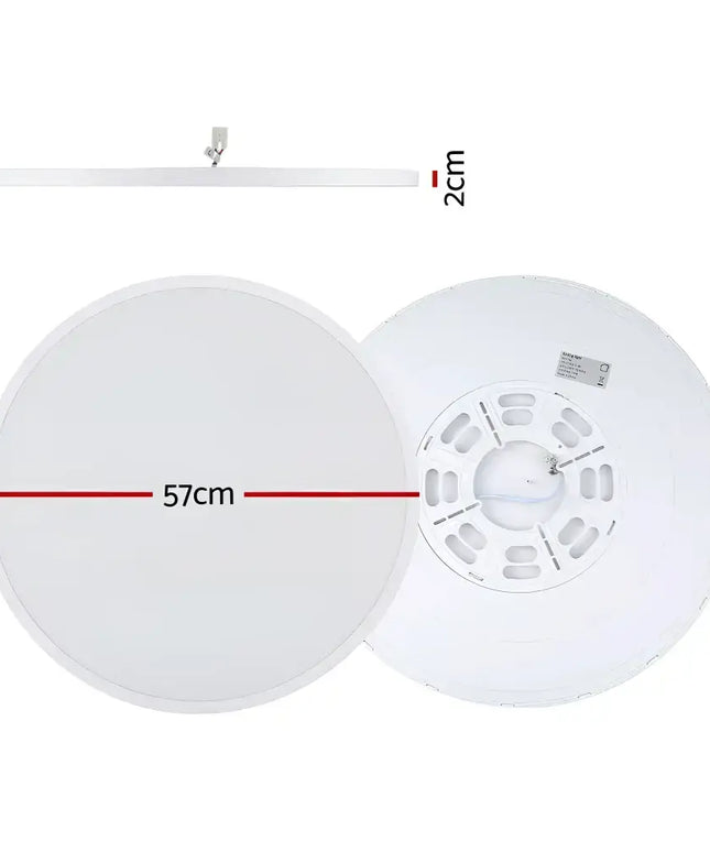 Round white ceiling light fixture from the 54W Tri Colour Ultra-THIN LED Oyster Lamp 60cm series