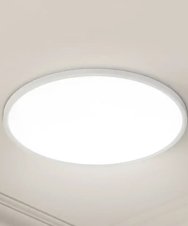 Round white ceiling light from 54W Tri Colour Ultra-THIN LED Oyster Lamp 60cm