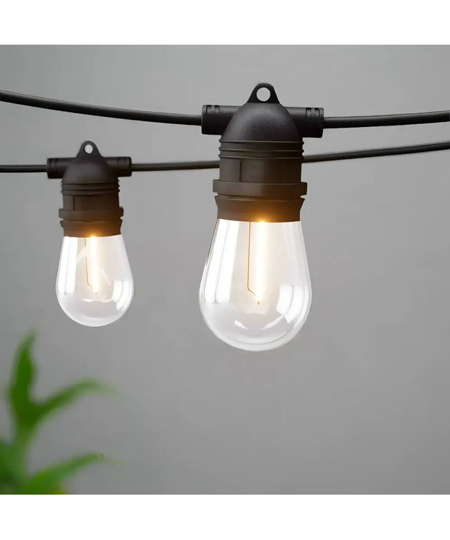 Hanging string lights with clear bulbs on 59m Black Festoon String Lights with 60 Bulb Plug in Kit