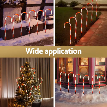 Illuminated candy cane decorations from 6 PCS Solar LED Christmas Lights Path Ground Light Garden Decorations