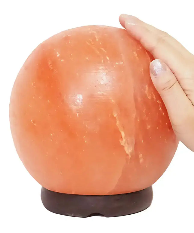 Complete 6-inch Himalayan salt lamp set with cord and bulb on display.