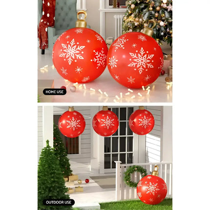 Red inflatable Christmas ornaments displayed on a 60cm Christmas Inflatable Ball Bauble outdoor decoration