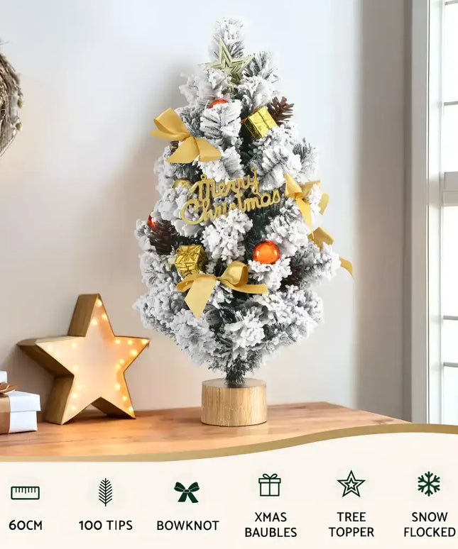 Decorated snow-flocked Christmas tree displayed on a 60CM Tabletop Snowy Christmas Tree