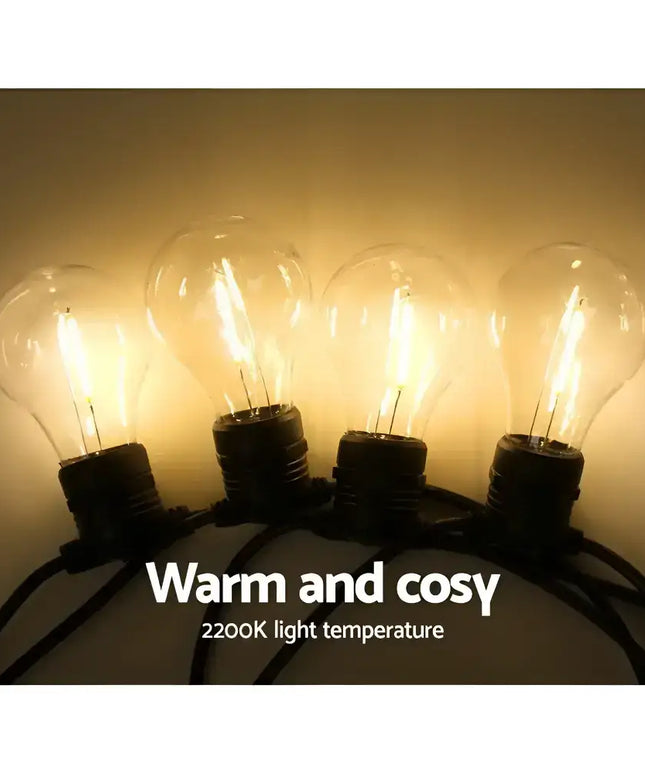 String of warm-toned light bulbs on 68m Black Festoon String Lights with 70 Bulb Plug-in Kit