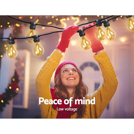 String of vintage-style lights from the 68m Black Festoon String Lights with 70 Bulb Plug in Kit