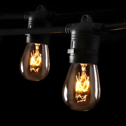 String of vintage-style lights from the 74m Black Festoon String Lights with 80 Bulb Plug in Kit