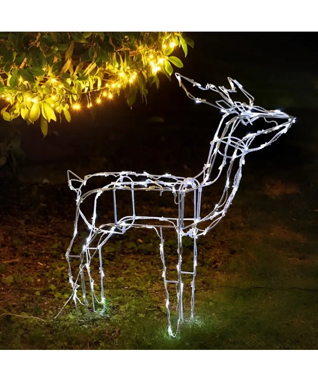 Illuminated wireframe reindeer glowing bright in front of the 80cm LED Reindeer – Standing display