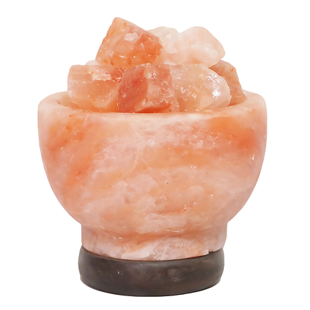 Fire bowl Himalayan salt lamp with a warm amber glow on a timber base.