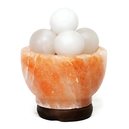 Fire bowl Himalayan salt lamp with polished white salt spheres, glowing softly on a timber base.