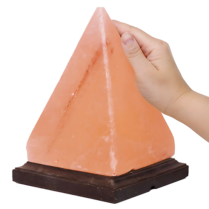 Geometric pyramid Himalayan salt lamp with a sturdy timber base and included 12W bulb.