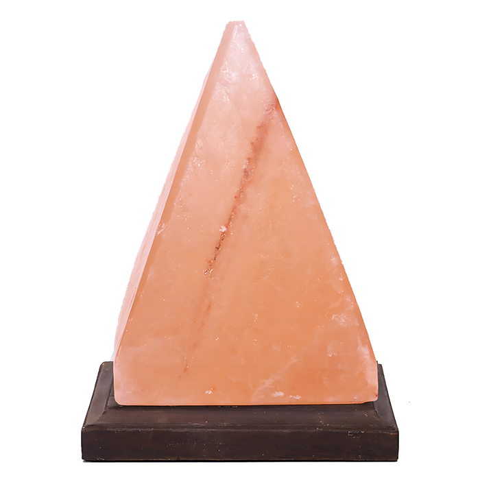 Modern pyramid Himalayan salt lamp illuminating a room with soft amber light.