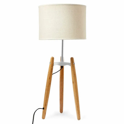 Bamboo tripod floor lamp with beige linen shade for elegant lighting decor
