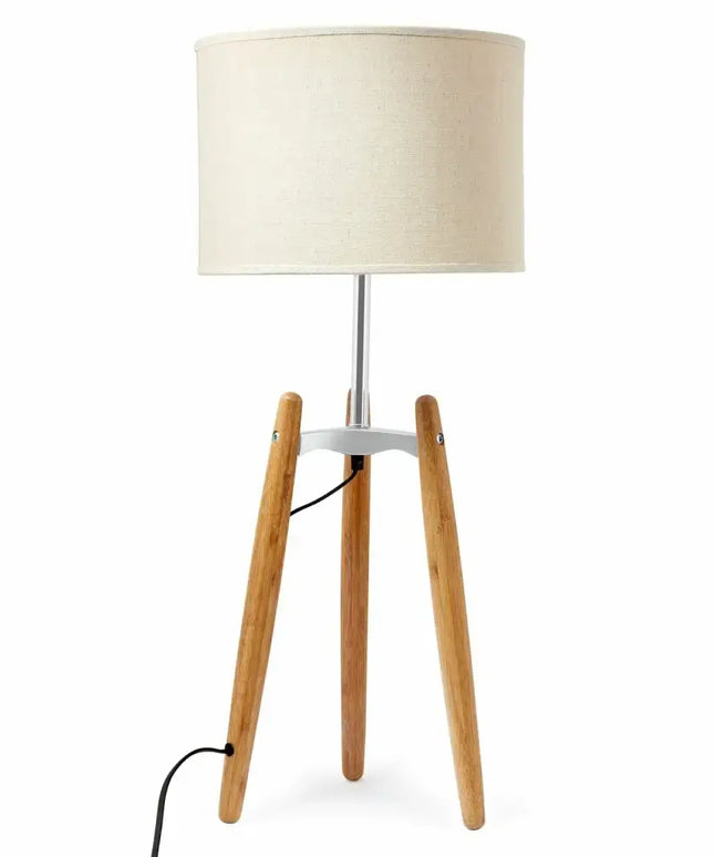Bamboo tripod floor lamp with beige linen shade for elegant lighting decor