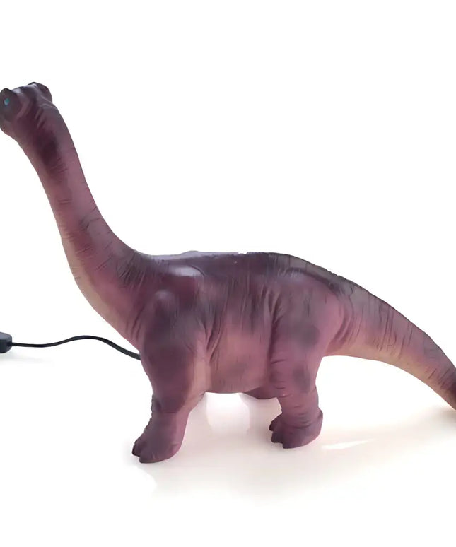Kids’ dinosaur table lamp with a warm, cozy light