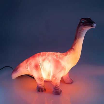 Close-up of the dinosaur LED lamp showing realistic details